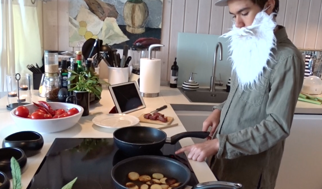 Contestant cooking at a stove